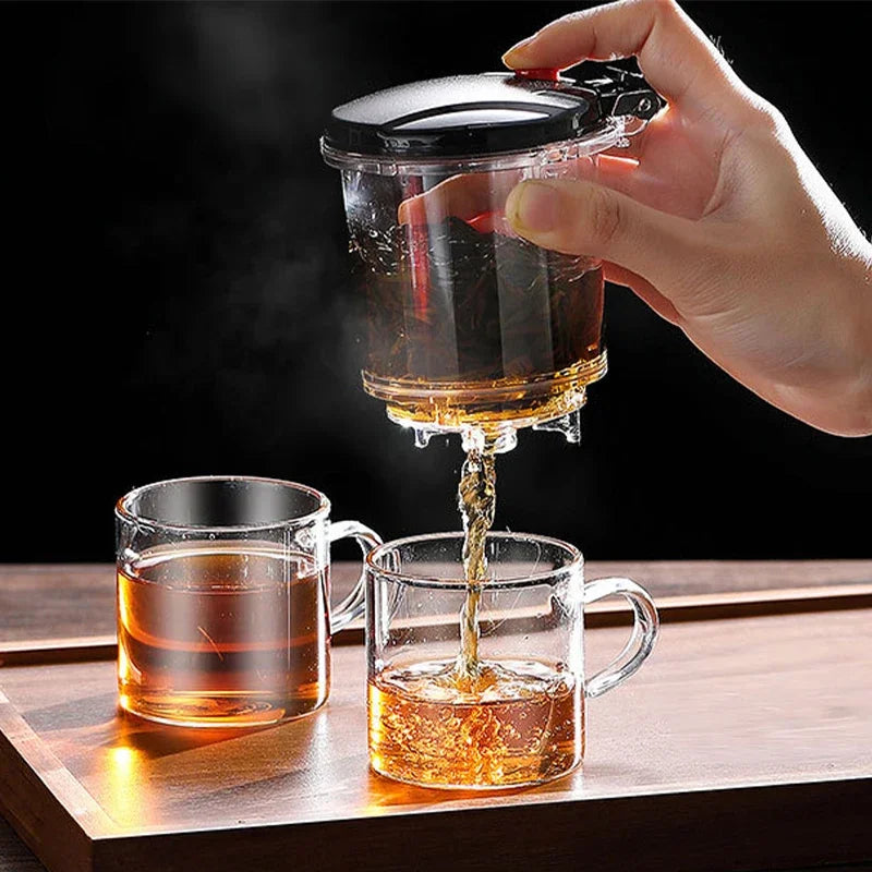 Tetera de vidrio resistente al calor con infusor de acero inoxidable. Ideal para preparar té de flores, Diseño elegante con asa ergonómica para un manejo cómodo.