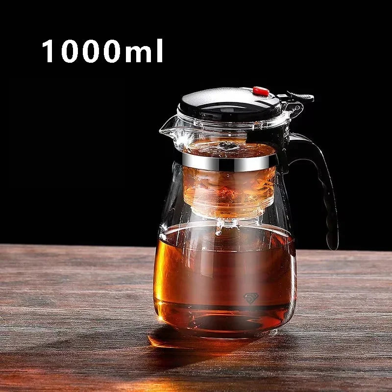 Tetera de vidrio resistente al calor con infusor de acero inoxidable. Ideal para preparar té de flores, Diseño elegante con asa ergonómica para un manejo cómodo.